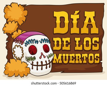 Poster with traditional sugar skull decorated with some marigold flowers and a wooden sign commemorating Mexican "Dia de los Muertos" (translate from Spanish: "Day of the Dead") celebration.