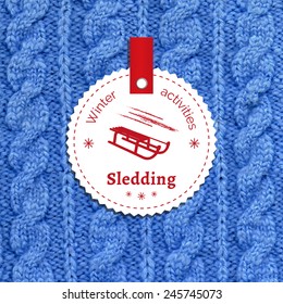 Poster for a winter activity. Motto, slogan for winter season. Sledding as a winter pleasure. Emblem for winter poster with a sled. Knitted wool background. Winter banner. Winter vector.