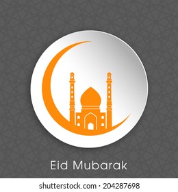 poster,banner or flyer of Eid Mubarak with intricate moon design and mosque.