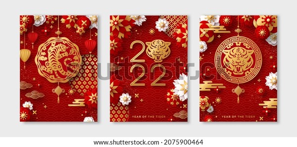 Posters\
Set for 2022 Chinese New Year. Hieroglyph translation - Tiger.\
Vector illustration. Asian Clouds, Lantern, Gold Pendant and Paper\
cut Flowers on Red Background. Place for\
Text.