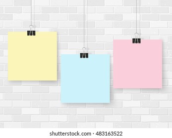 Posters template on grey brick wall. Realistic wall gallery vector illustration. Set of colorful empty vector notes mockup for your illustrations, drawings, posters or quotes.