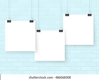 Posters template on grey brick wall. Realistic wall gallery vector illustration. Set of white empty vector notes mockup for your illustrations, drawings, logos, posters or quotes.