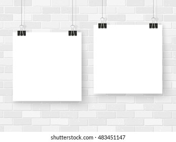 Posters template on white brick wall. Realistic wall gallery vector illustration. Set of colorful empty vector mockups for your illustrations, drawings, posters or photos.