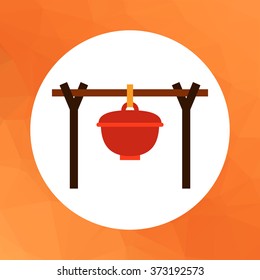 Pot handing above bonfire