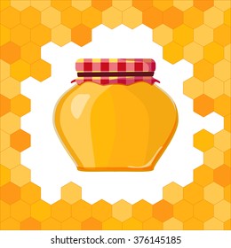 pot of honey with honeycomb