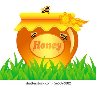 pot of honey on the green grass