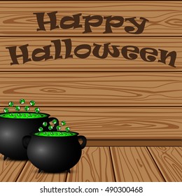 Pot with a potion witch on a background of the wooden planks on Halloween
