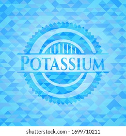 Potassium light blue emblem with triangle mosaic background