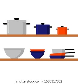 pots, pans, and mix bowls on shelves in the kitchen