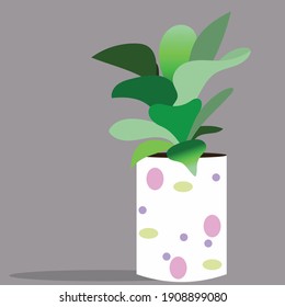 Potted Green Plant with Colorful Polka Dots