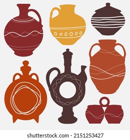Pottery set with decor lines. Image of ceramic pots made of handmade clay