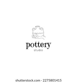 Pottery Studio Logo. Hand drawn pot on the hand.