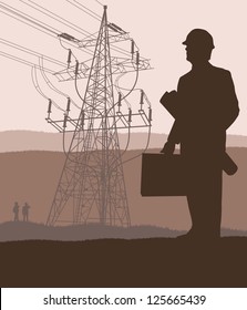 Power high voltage tower with engineer in front of it