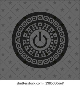 power icon inside black emblem