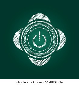 power icon inside chalkboard emblem written on a blackboard