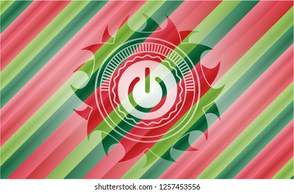 power icon inside christmas badge.