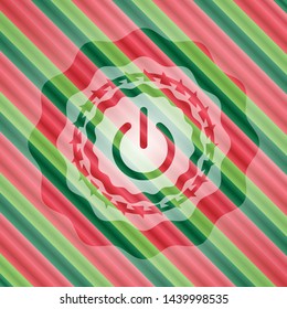 power icon inside christmas colors style badge.