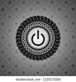 power icon inside dark badge or emblem