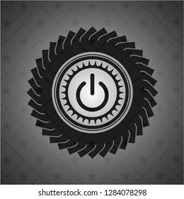 power icon inside dark emblem