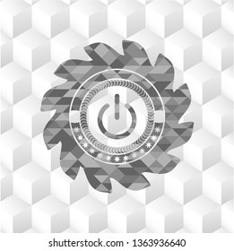 power icon inside grey badge with geometric cube white background