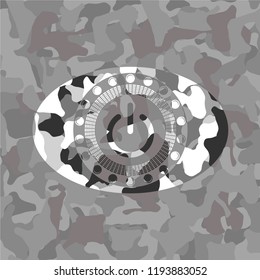 power icon inside grey camo texture