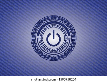 power icon inside jean or denim emblem or badge background
