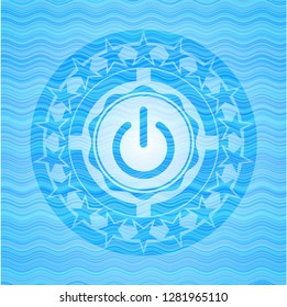 power icon inside light blue water style emblem.