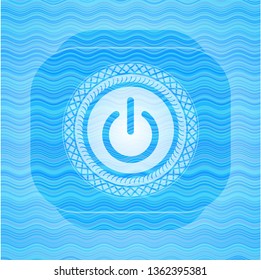 power icon inside light blue water wave style badge.
