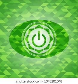 power icon inside realistic green emblem. Mosaic background