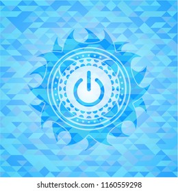power icon inside realistic light blue mosaic emblem