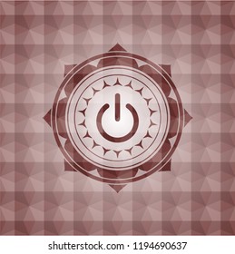 power icon inside red seamless badge with geometric pattern background.