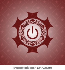 power icon inside retro style red emblem