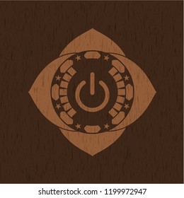 power icon inside retro wood emblem