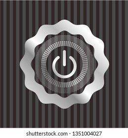 power icon inside silvery emblem
