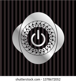 power icon inside silvery shiny emblem