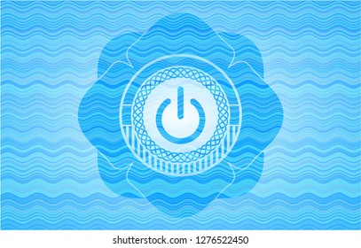 power icon inside sky blue water emblem.
