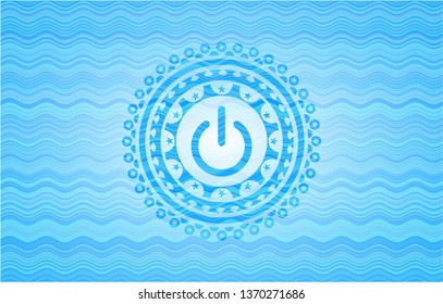 power icon inside sky blue water emblem.