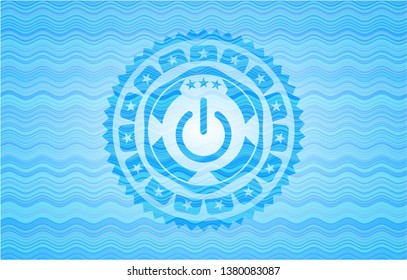 power icon inside sky blue water emblem.