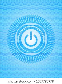power icon inside water concept style badge.
