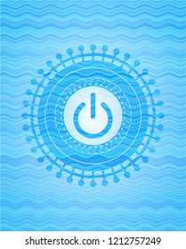 power icon inside water wave style badge.