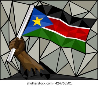 Powerful Hand Raising The Flag Of South Sudan