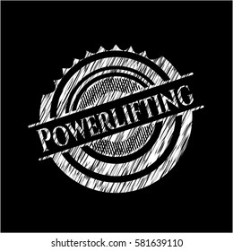 Powerlifting chalkboard emblem written on a blackboard