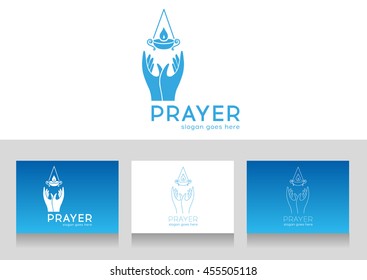 Prayer  hands with lamp