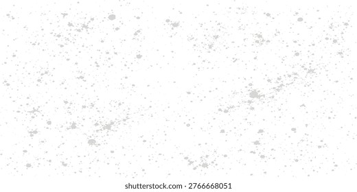 A predominantly white background speckled with numerous small irregularly shaped gray markings
