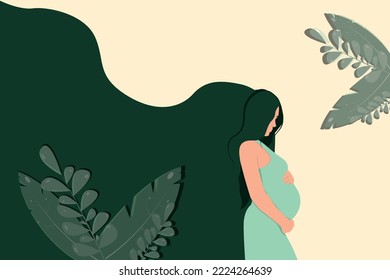 A pregnant beautiful woman hugs her pregnant belly against a background of  plants and flowers.Modern banner about pregnancy and motherhood.