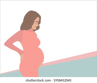 A pregnant girl is holding her belly. Place for text about pregnancy. Planning and management of pregnancy by a doctor