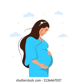 pregnant girl smiles and strokes her belly