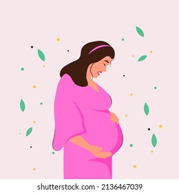 pregnant girl smiles and strokes her belly
