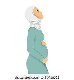 Pregnant muslim woman side view in a blue hijab tenderly holds her belly with a happy smile