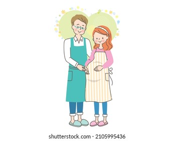 Pregnant smiling woman and husband in apron